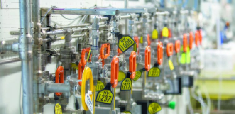 Industrial identification tags and nameplates